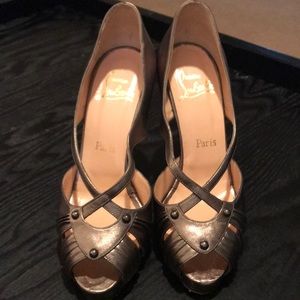 Christian Louboutin gold heels